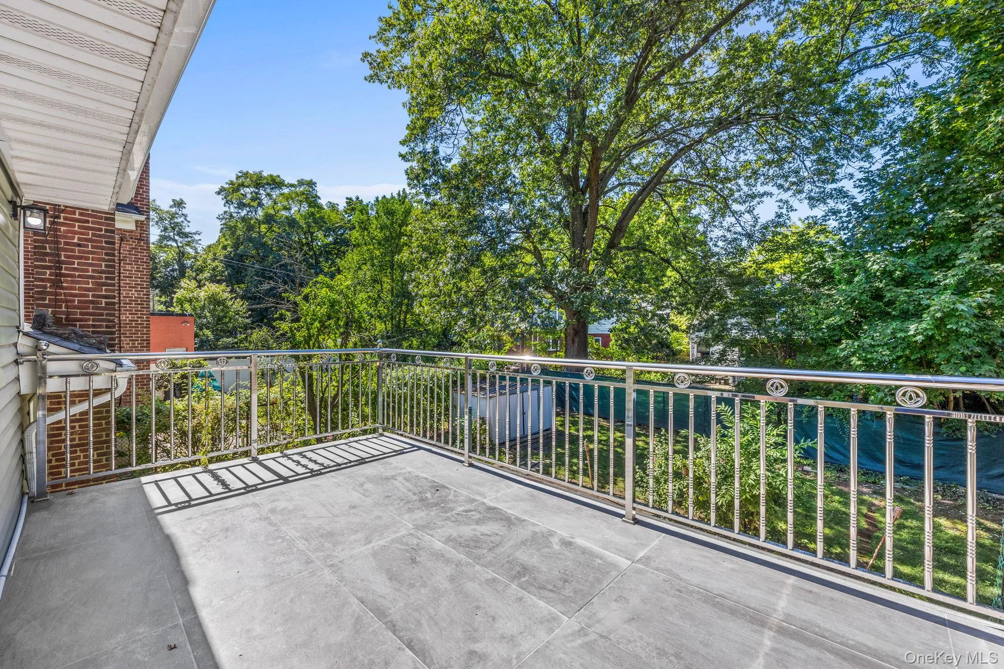 Balcony with view of wooded area Balcony with view of wooded area
