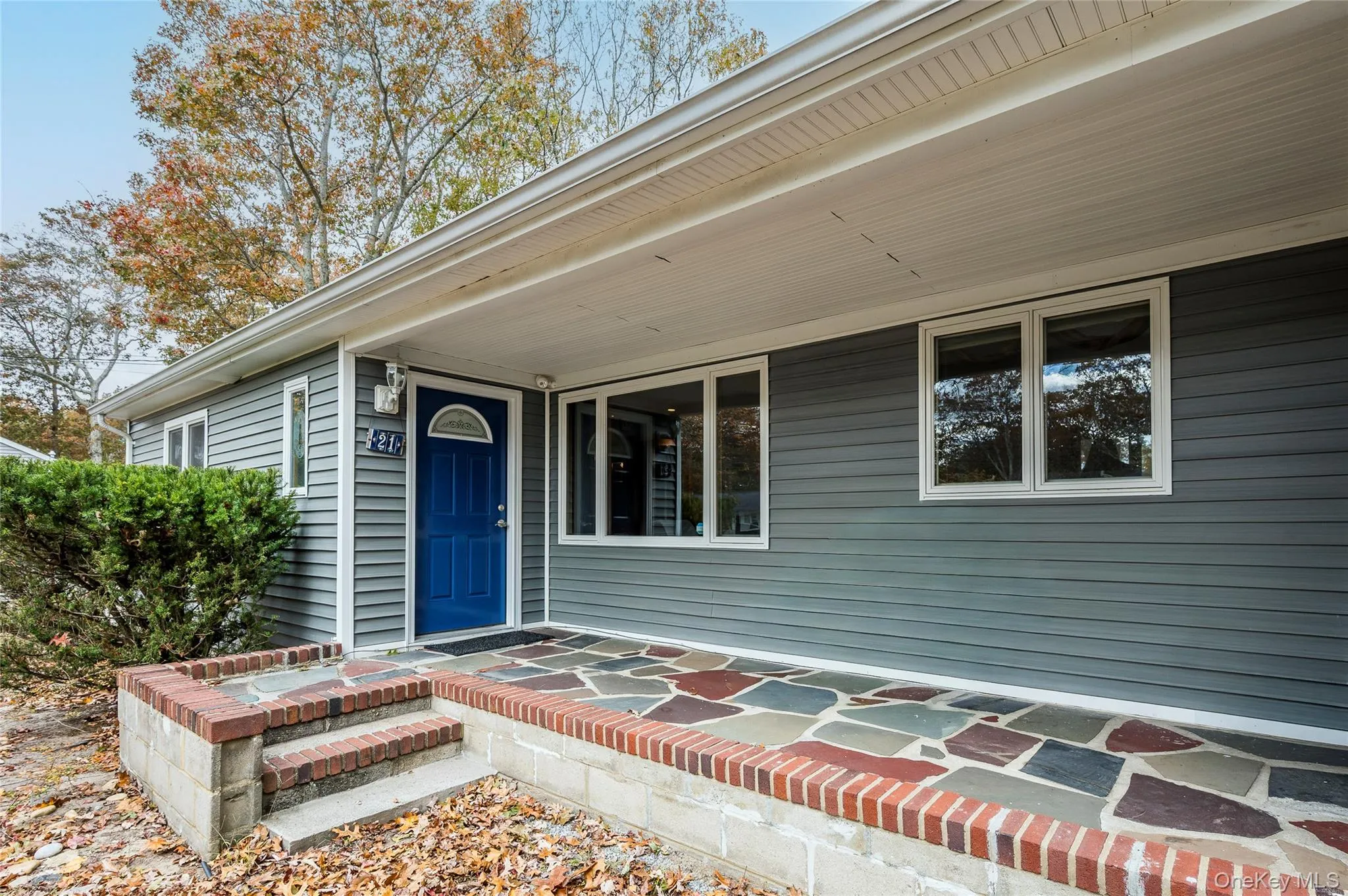 Property entrance featuring covered porch
