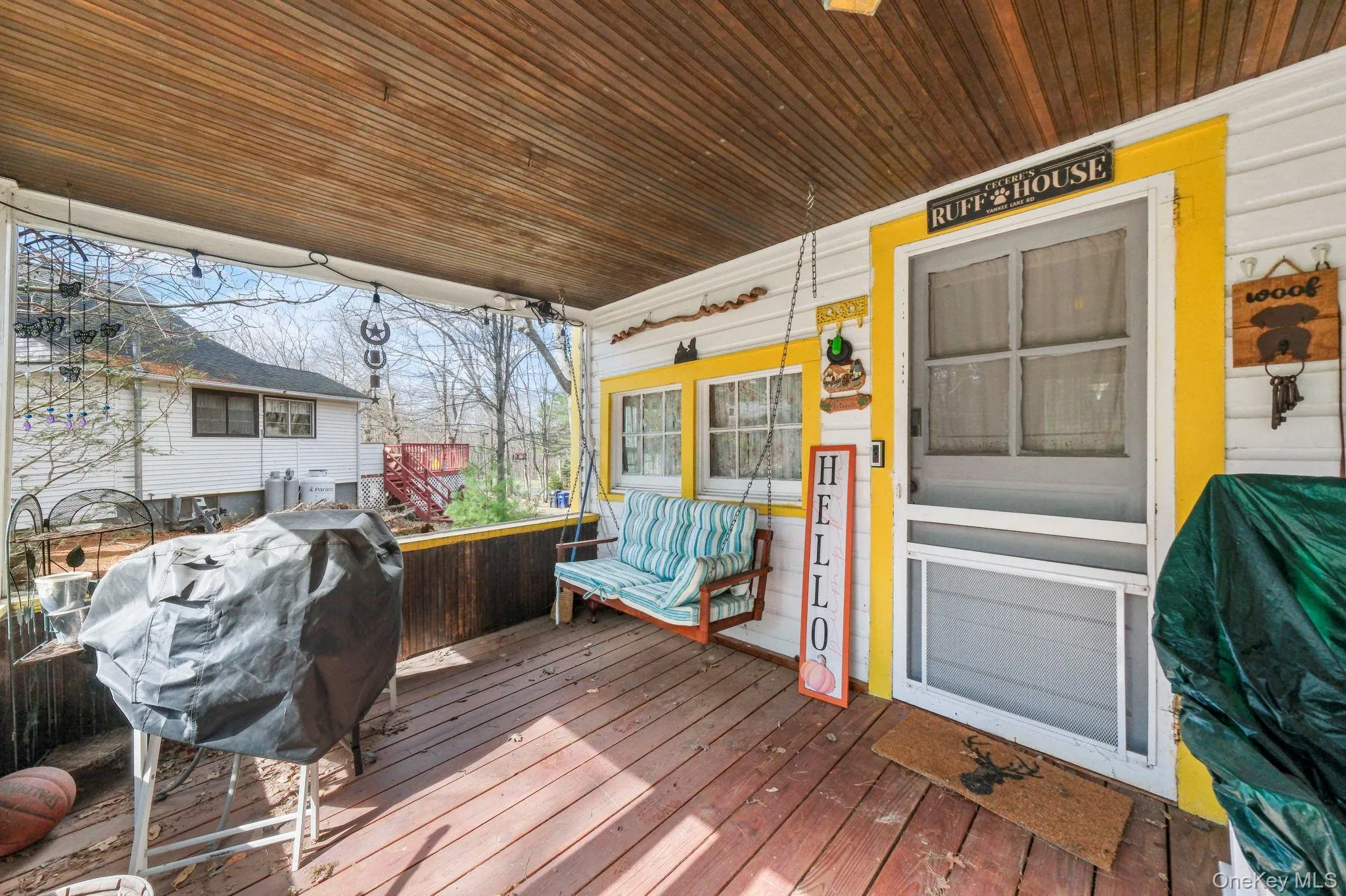 Porch featuring a grill Porch featuring a grill