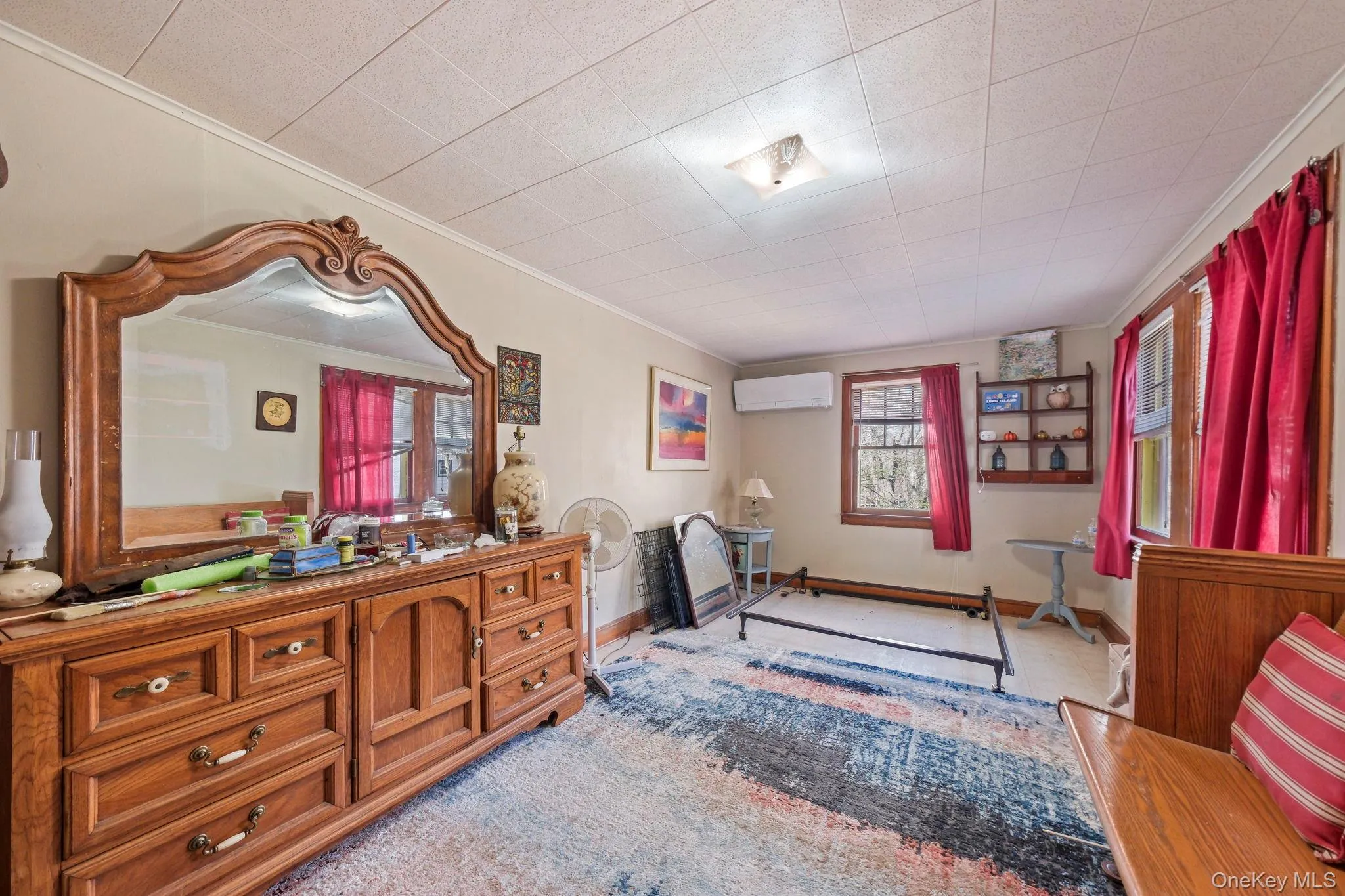 Bedroom with ornamental molding Bedroom with ornamental molding