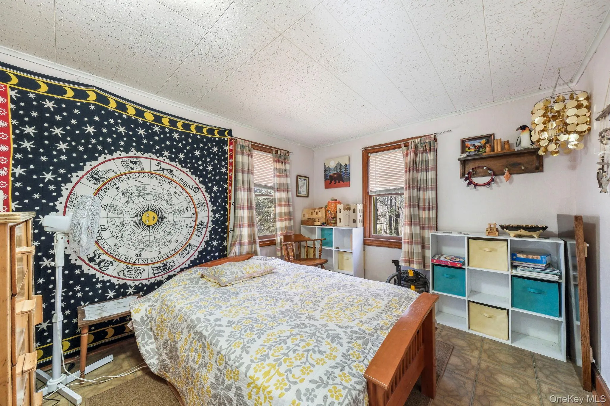 Bedroom featuring tile patterned floors Bedroom featuring tile patterned floors