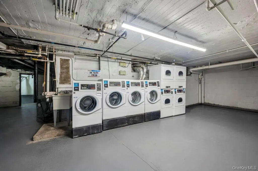 Community laundry with separate washer and dryer Community laundry with separate washer and dryer