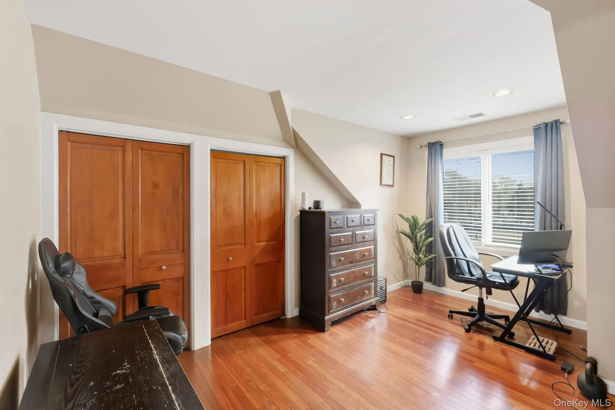 Office area featuring light wood-type flooring and recessed lighting Office area featuring light wood-type flooring and recessed lighting