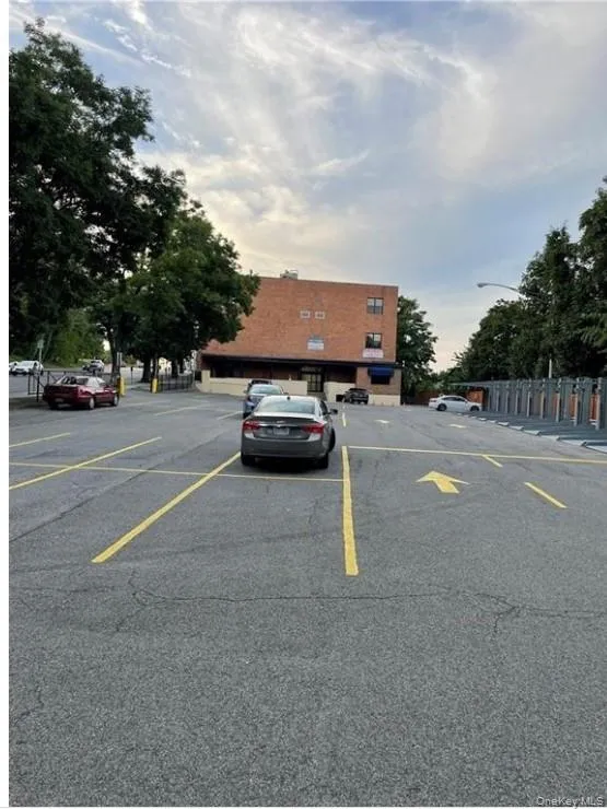 View of uncovered parking lot View of uncovered parking lot
