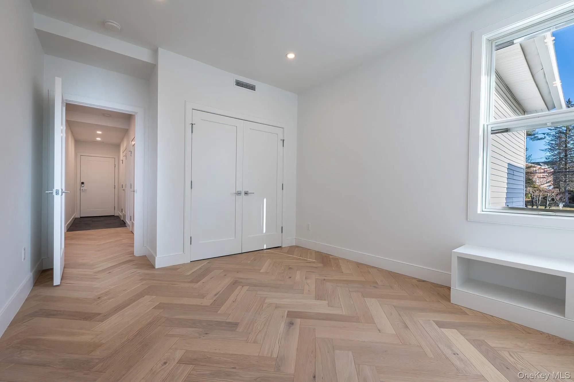 Unfurnished bedroom with recessed lighting and a closet Unfurnished bedroom with recessed lighting and a closet