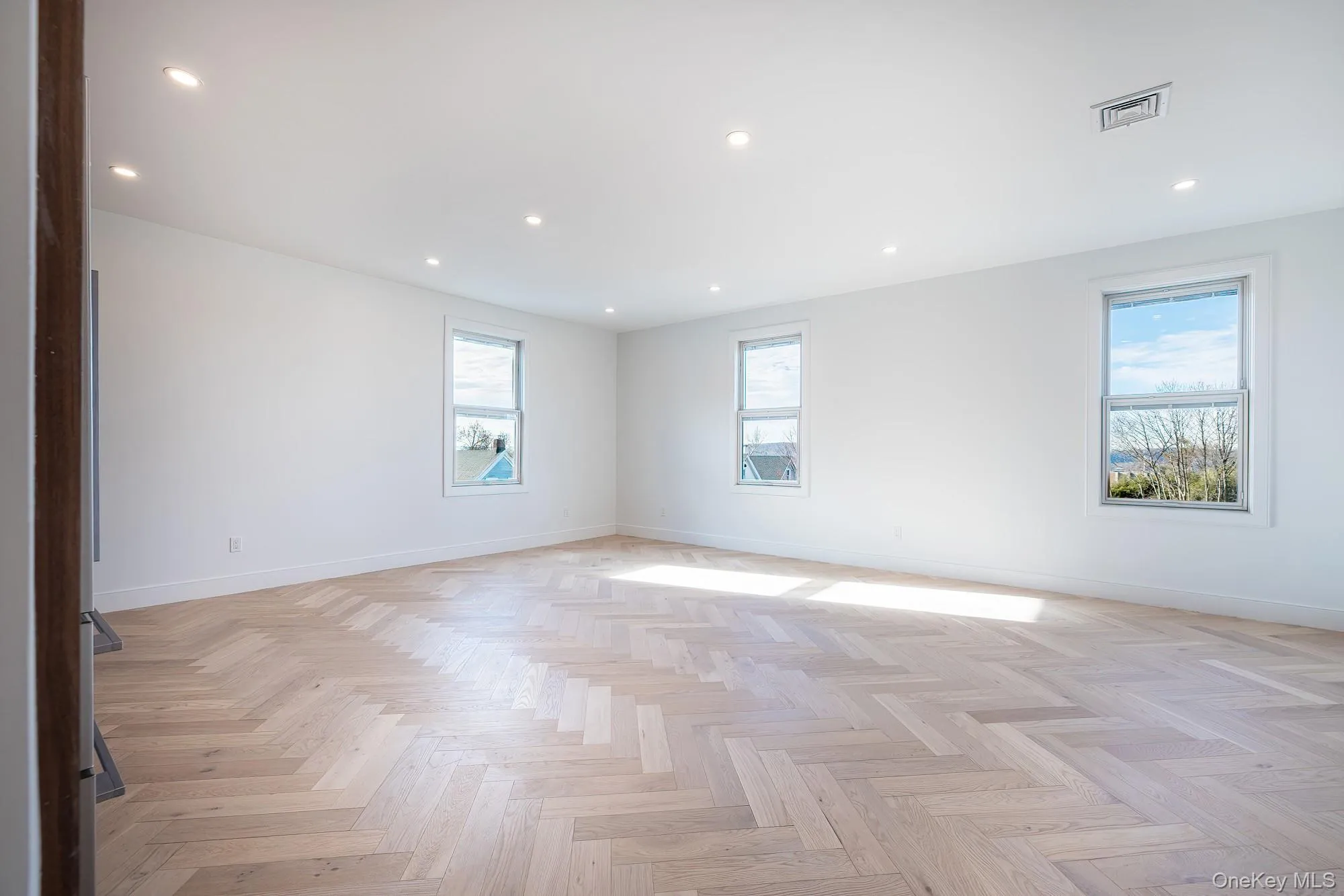Empty room with recessed lighting and baseboards Empty room with recessed lighting and baseboards