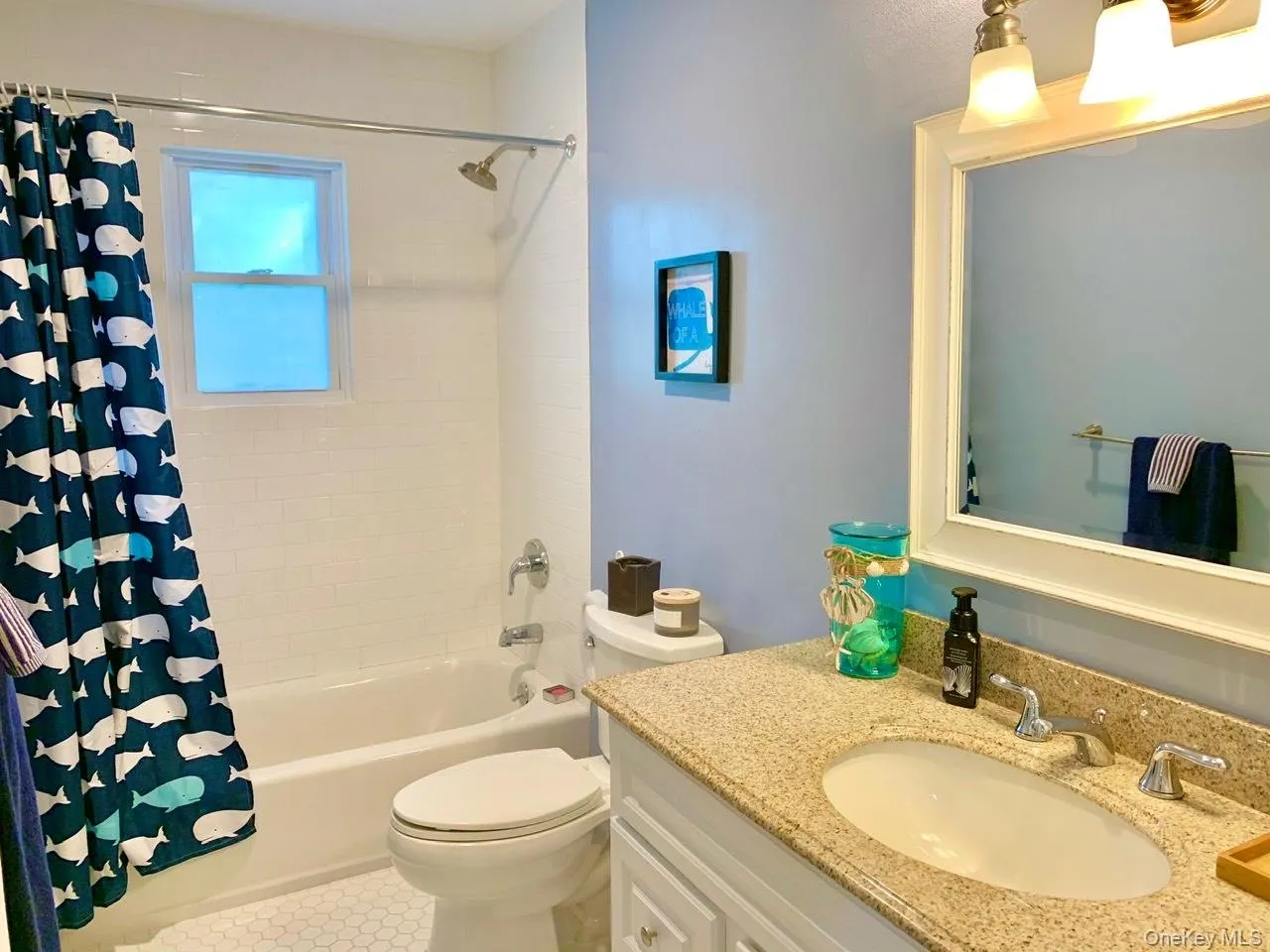 Full bath with shower / bath combo with shower curtain and vanity Full bath with shower / bath combo with shower curtain and vanity