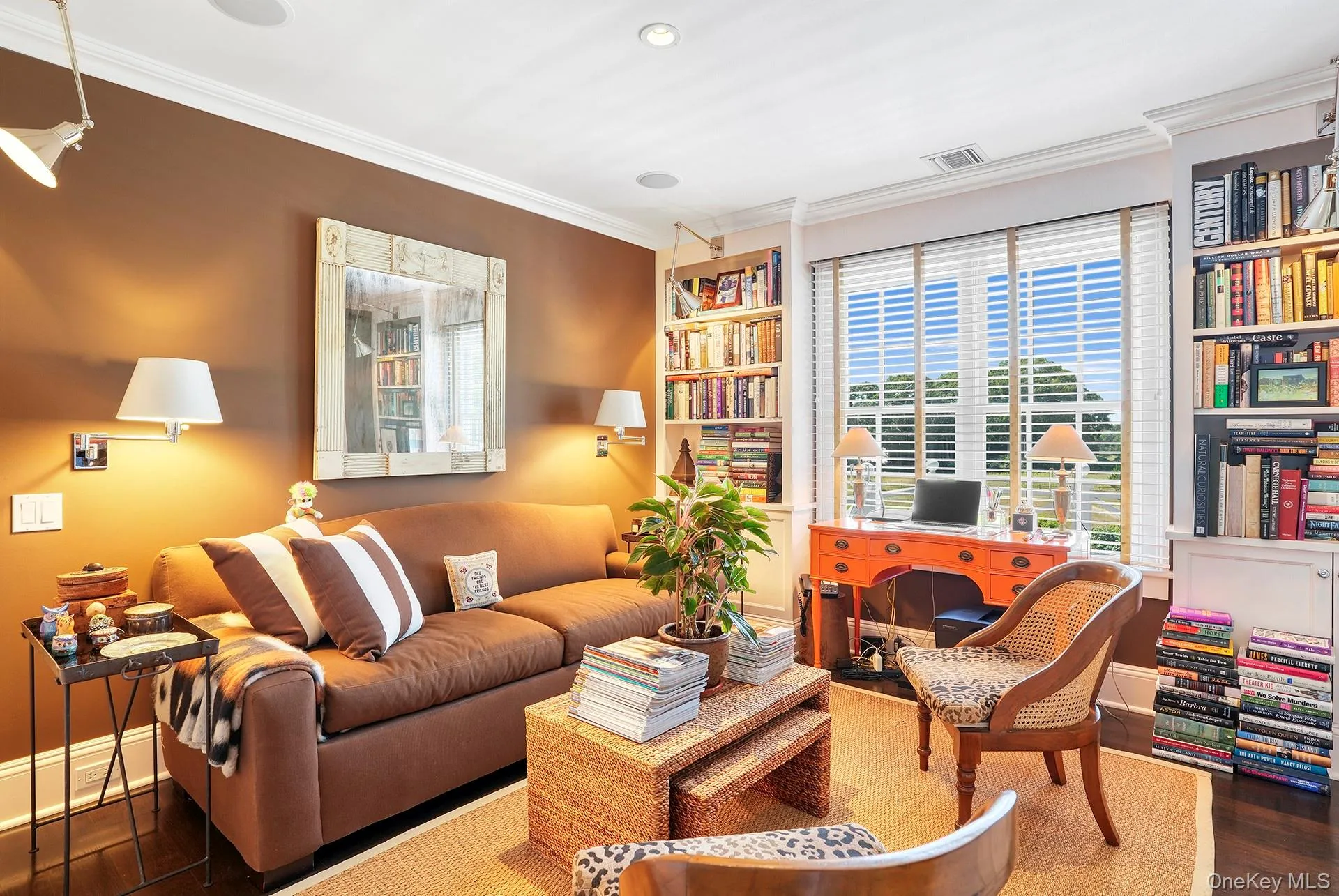 Office space with dark wood-type flooring, ornamental molding, and recessed lighting Office space with dark wood-type flooring, ornamental molding, and recessed lighting