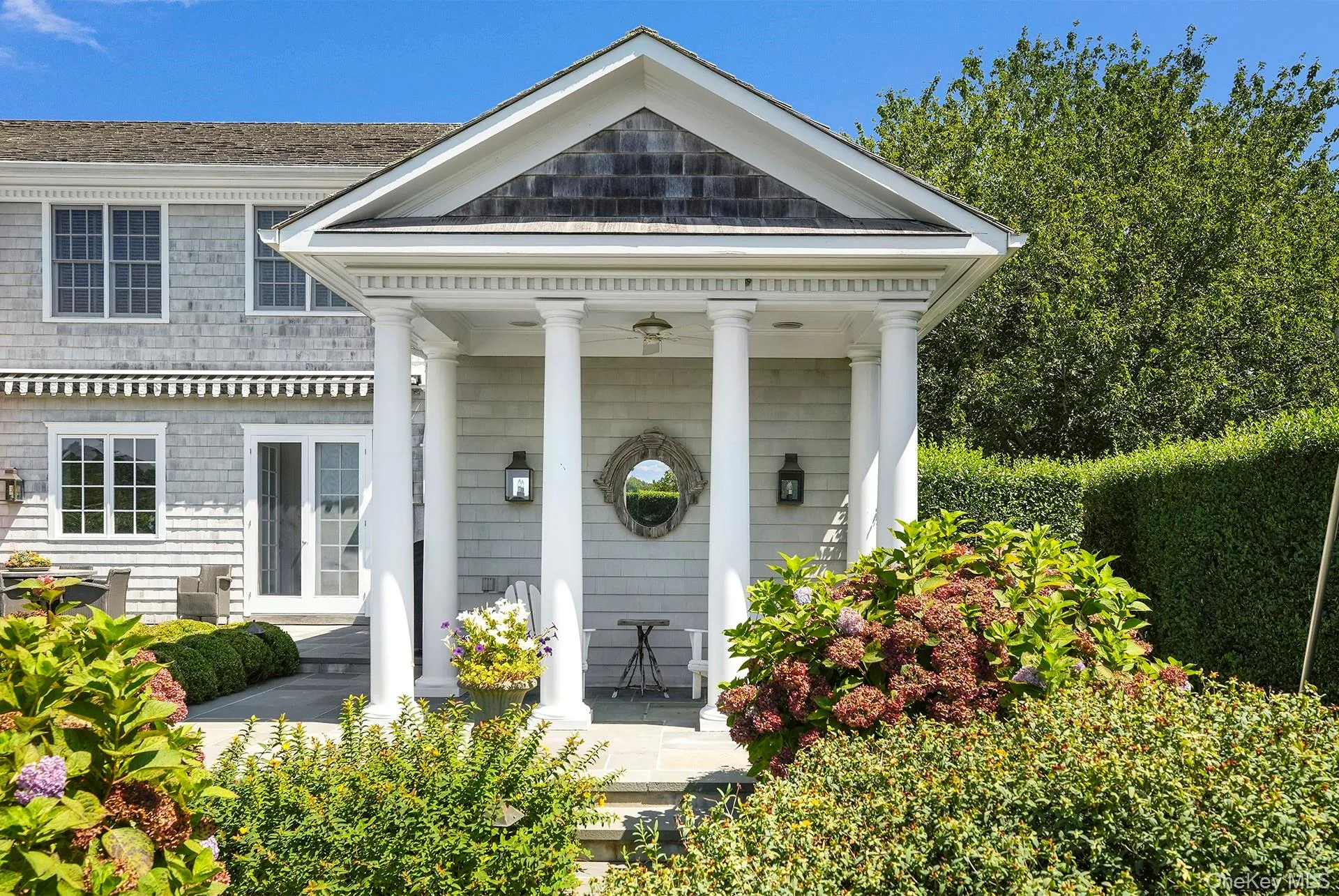 View of exterior entry with a porch View of exterior entry with a porch