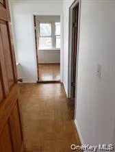 Corridor featuring baseboards Corridor featuring baseboards