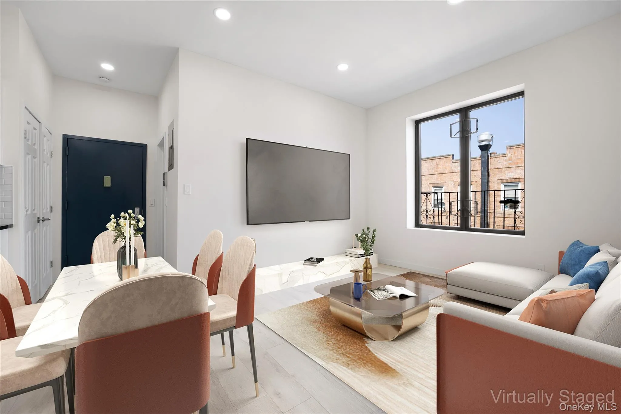 Living area with recessed lighting and wood finished floors Living area with recessed lighting and wood finished floors