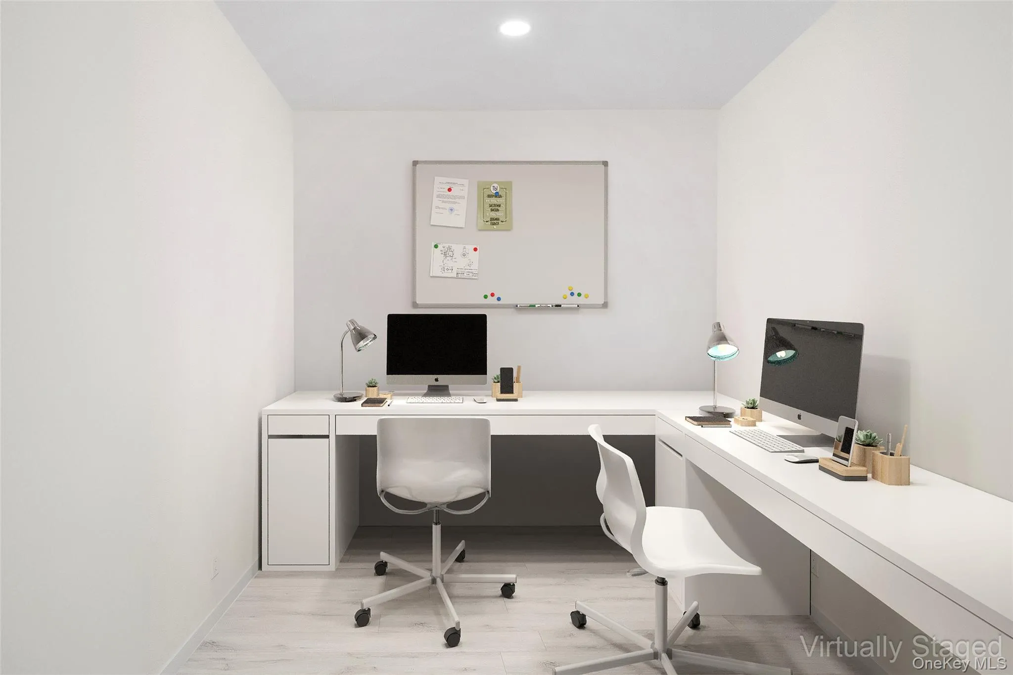 Home office with light wood finished floors, recessed lighting, and built in desk Home office with light wood finished floors, recessed lighting, and built in desk