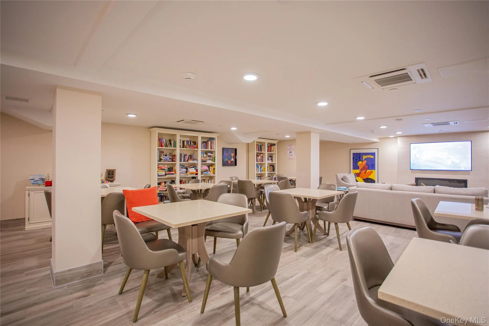 Dining area featuring light wood finished floors and recessed lighting Dining area featuring light wood finished floors and recessed lighting