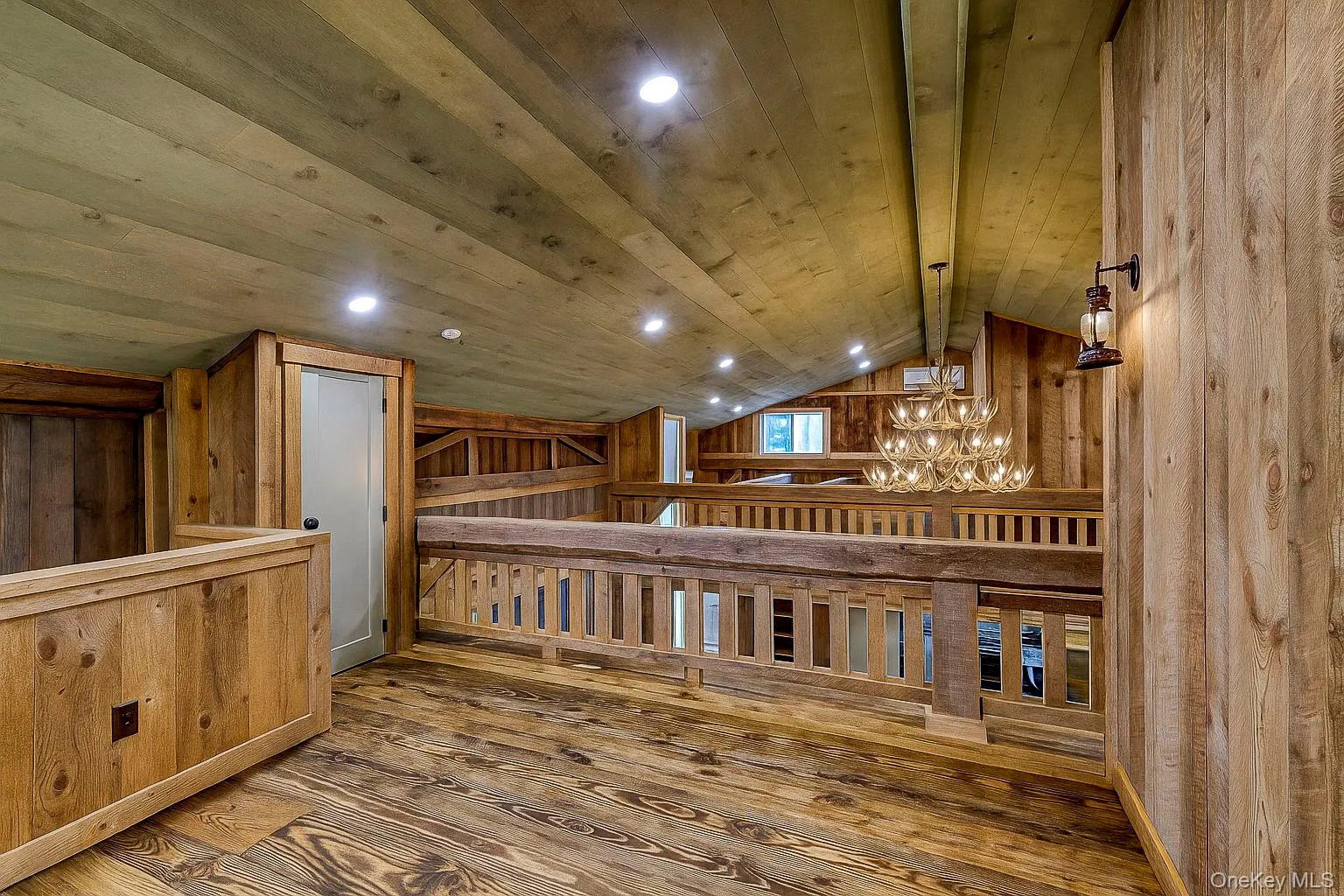 Additional living space featuring wood walls, wooden ceiling, hardwood / wood-style flooring, recessed lighting, and lofted ceiling Additional living space featuring wood walls, wooden ceiling, hardwood / wood-style flooring, recessed lighting, and lofted ceiling