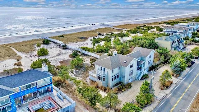 Bird's eye view of unending shoreline. 174’ oceanfront.
