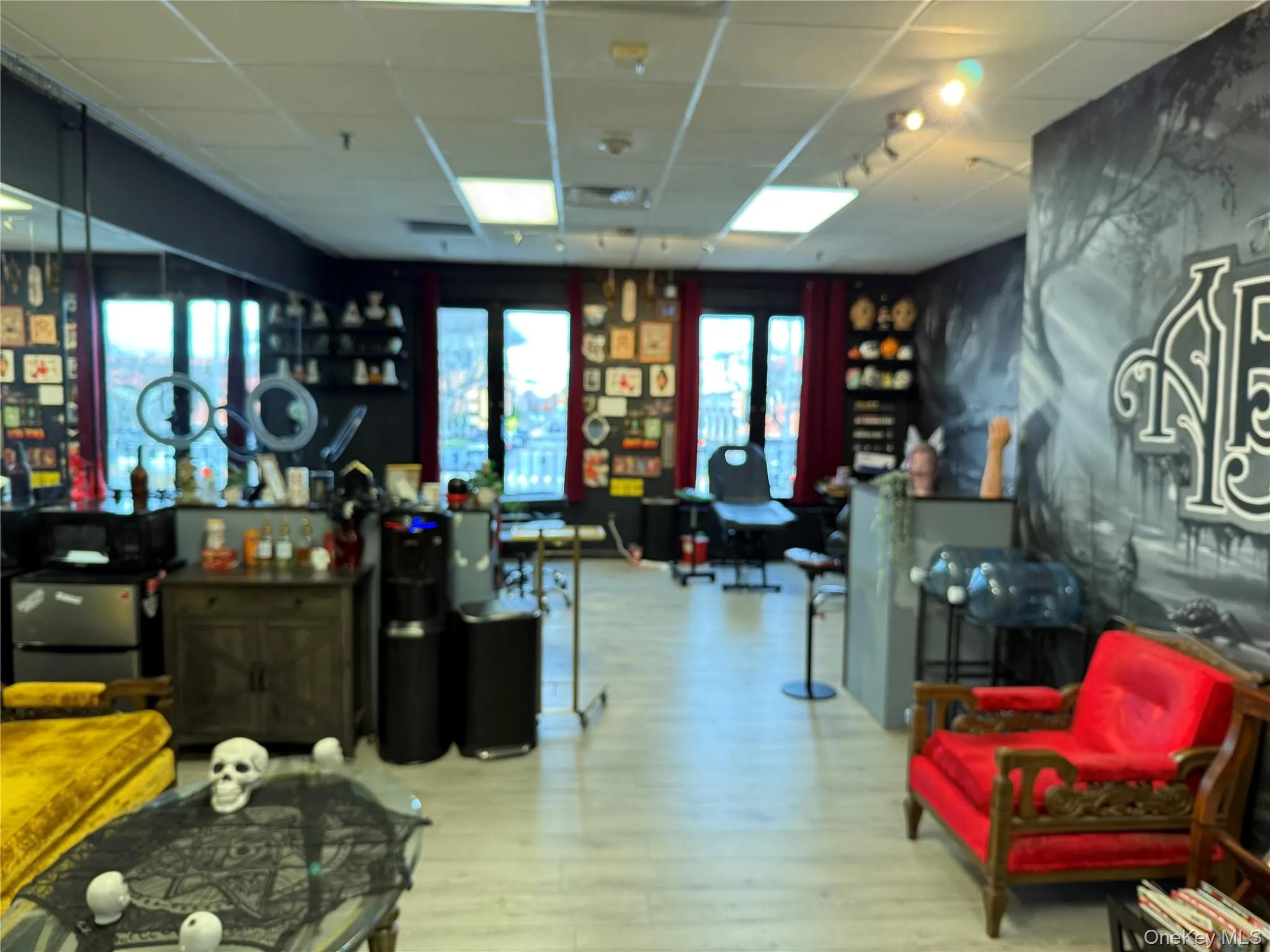 Miscellaneous room featuring a drop ceiling Miscellaneous room featuring a drop ceiling