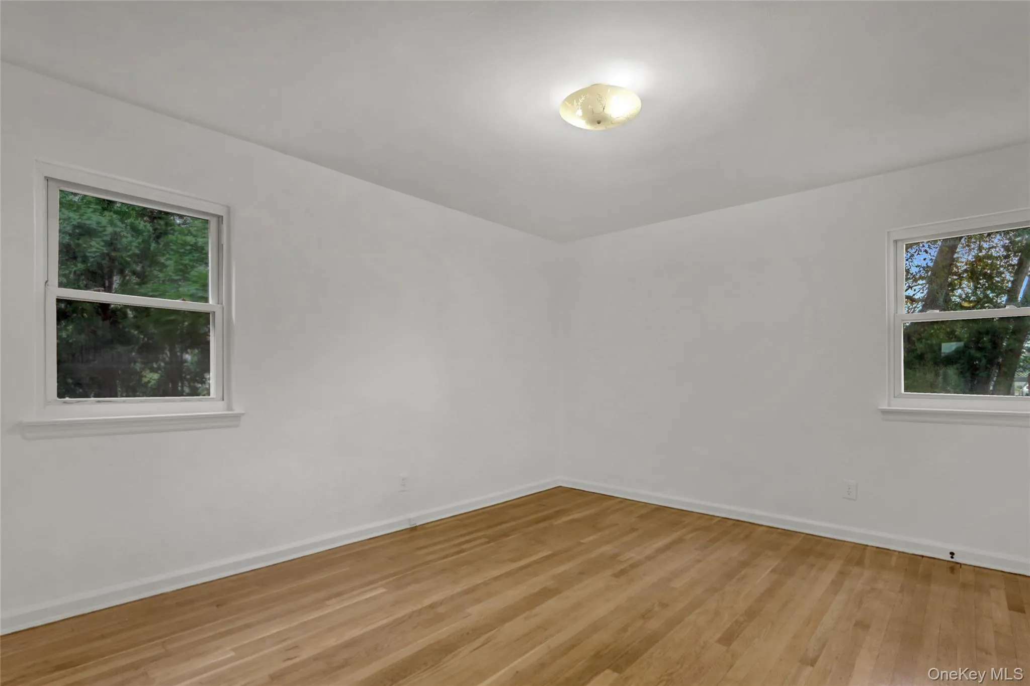 Bedroom 2nd view with light wood-style flooring Bedroom 2nd view with light wood-style flooring