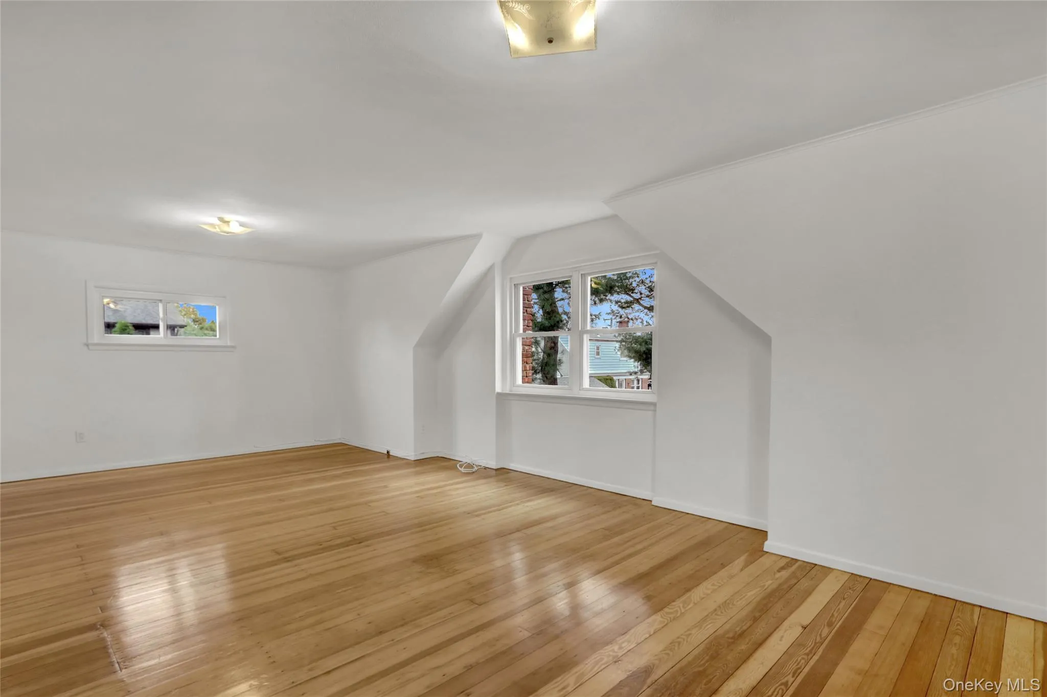 2nd angle of 2nd floor bedroom featuring light wood finished floors and plenty of natural light 2nd angle of 2nd floor bedroom featuring light wood finished floors and plenty of natural light