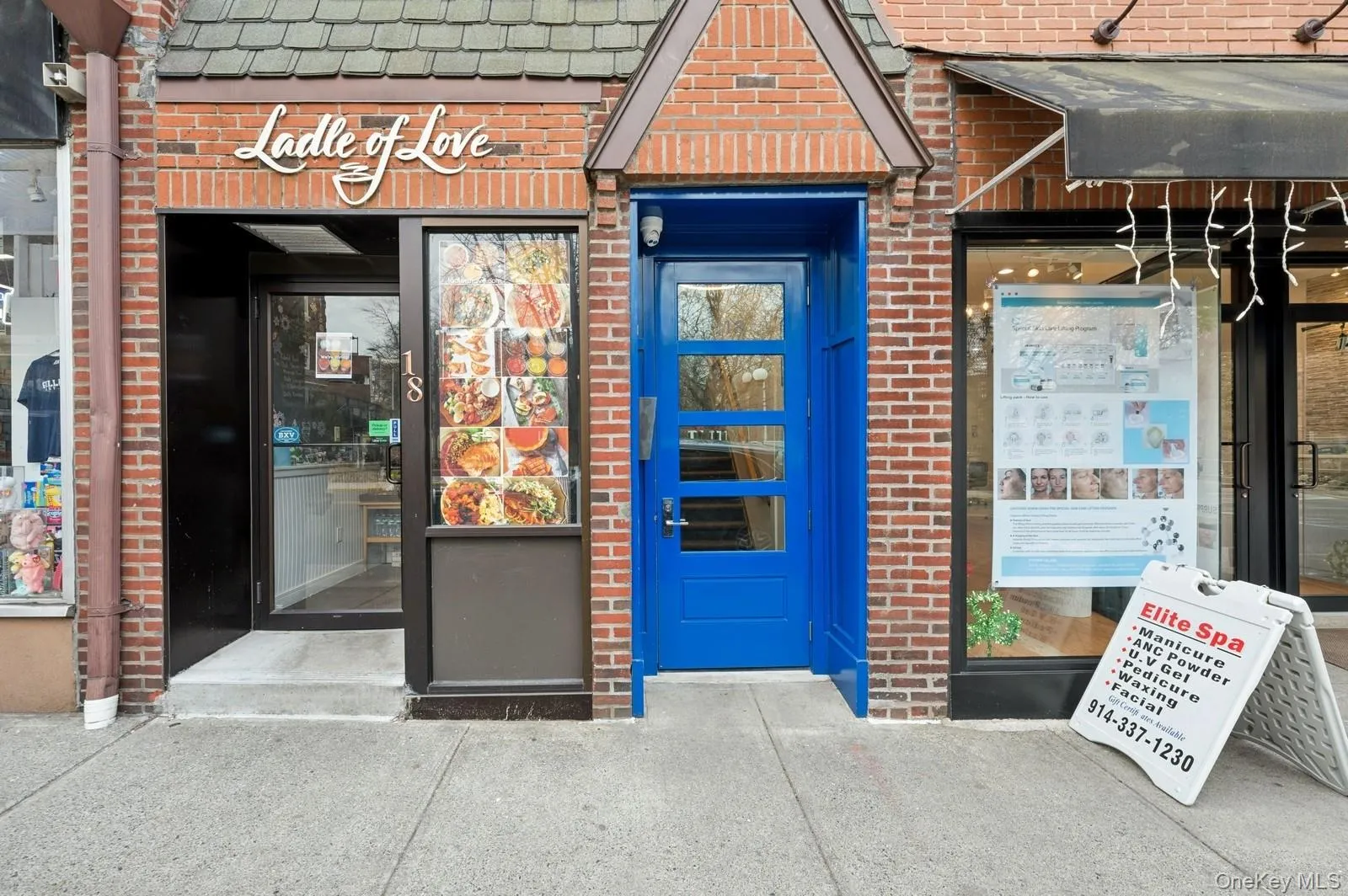 Doorway to property with brick siding Doorway to property with brick siding