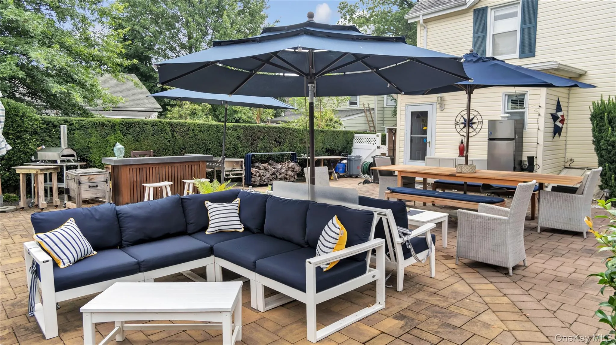View of patio featuring outdoor dining space View of patio featuring outdoor dining space