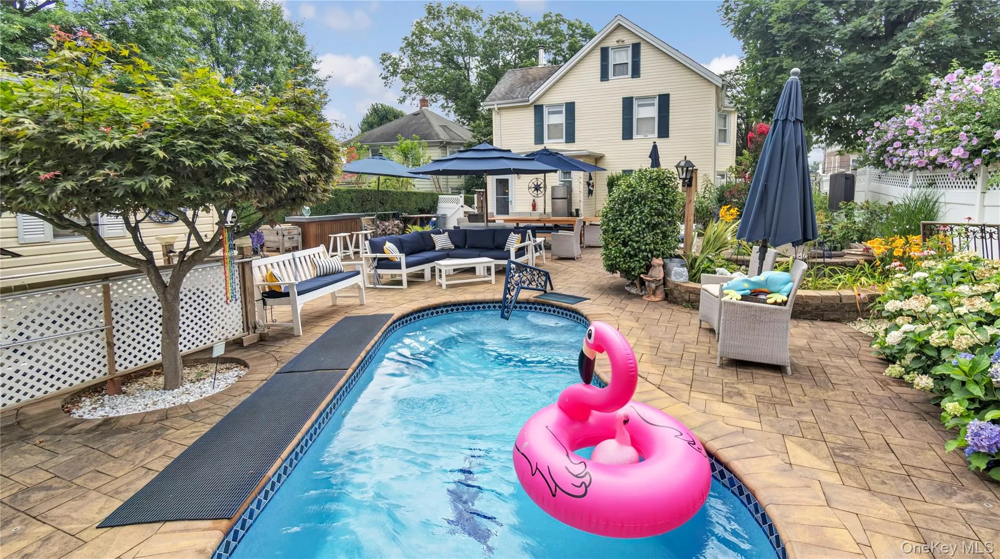 View of pool with an outdoor hangout area, a patio, and a gazebo View of pool with an outdoor hangout area, a patio, and a gazebo
