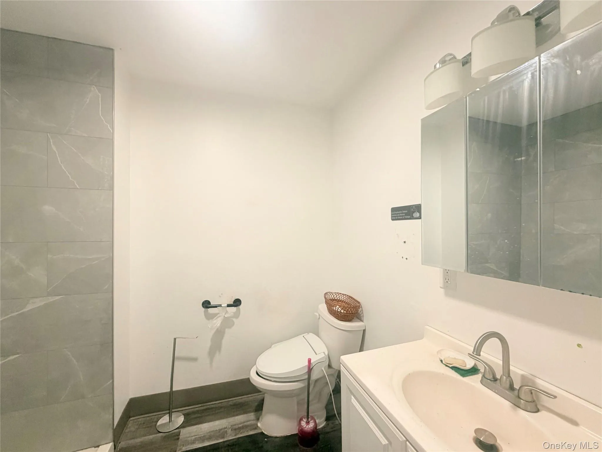 Full bath with vanity and a tile shower Full bath with vanity and a tile shower
