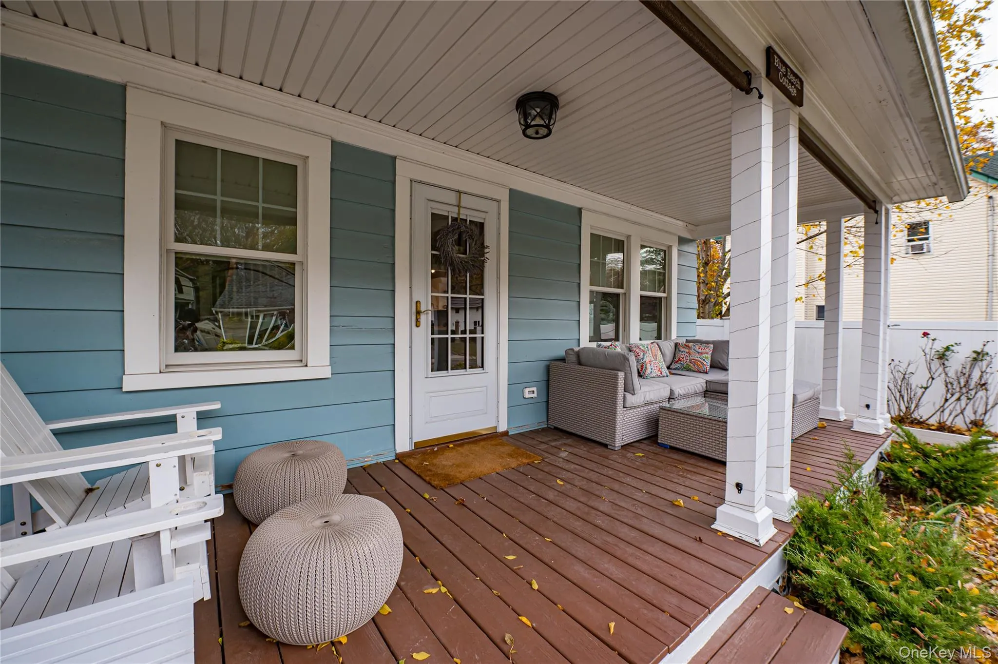 Porch featuring outdoor lounge area Porch featuring outdoor lounge area