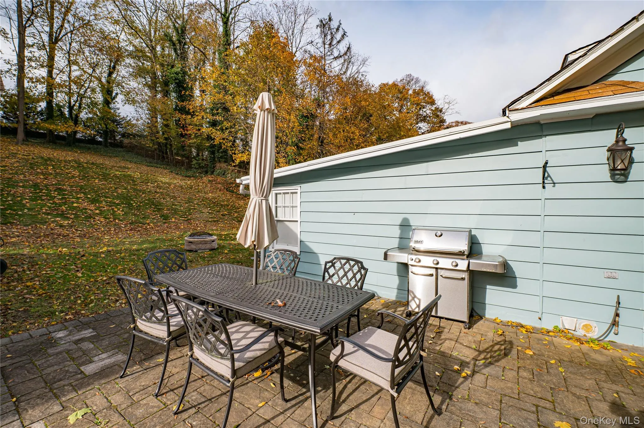 View of patio with a grill and outdoor dining space View of patio with a grill and outdoor dining space