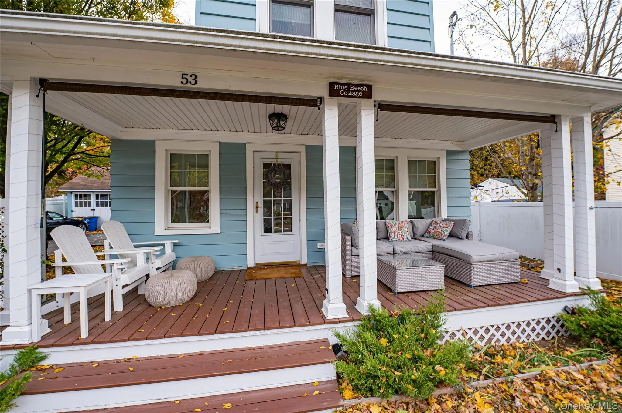Wooden porch featuring outdoor lounge area Wooden porch featuring outdoor lounge area