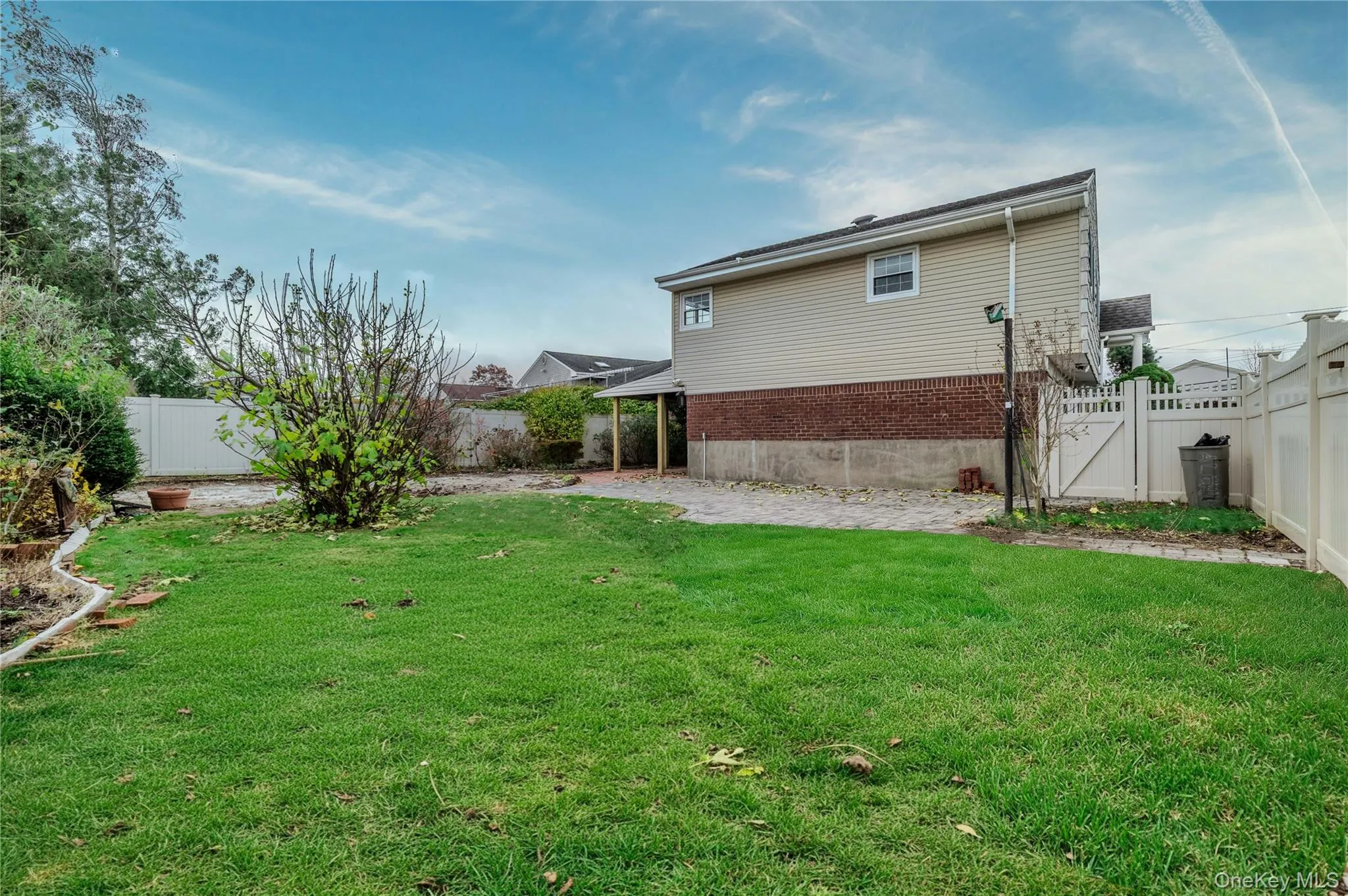Fenced backyard featuring a patio Fenced backyard featuring a patio