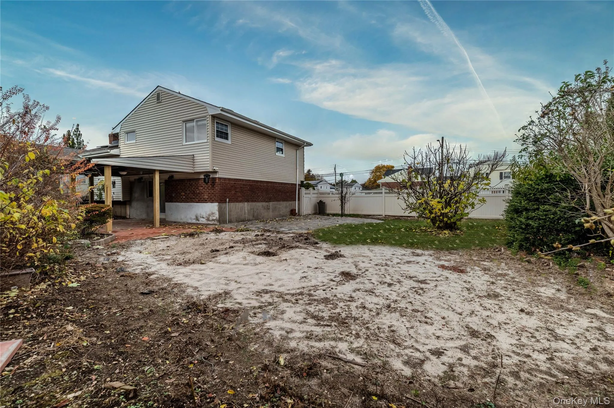 View of side of property with brick siding View of side of property with brick siding