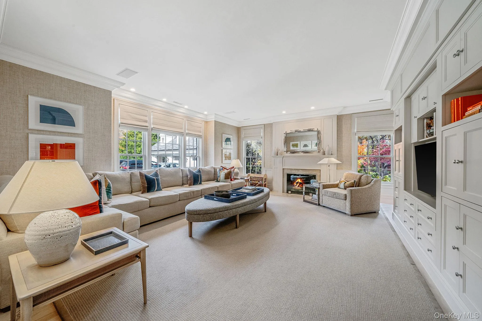 Family Room with a glass covered fireplace Family Room with a glass covered fireplace