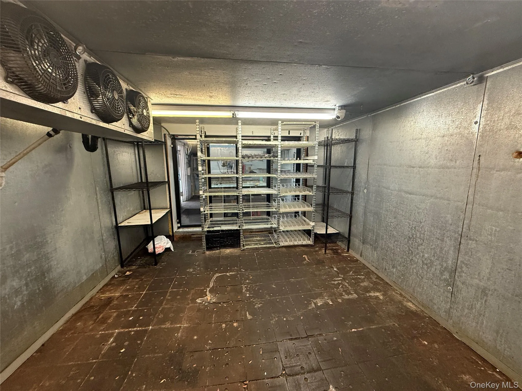 Below grade area featuring a textured ceiling Below grade area featuring a textured ceiling