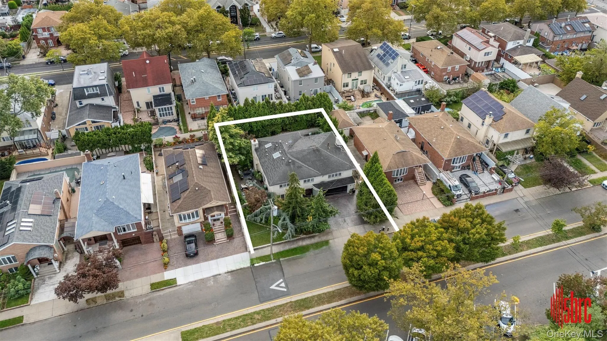 Aerial perspective of suburban area featuring property boundaries highlighted Aerial perspective of suburban area featuring property boundaries highlighted