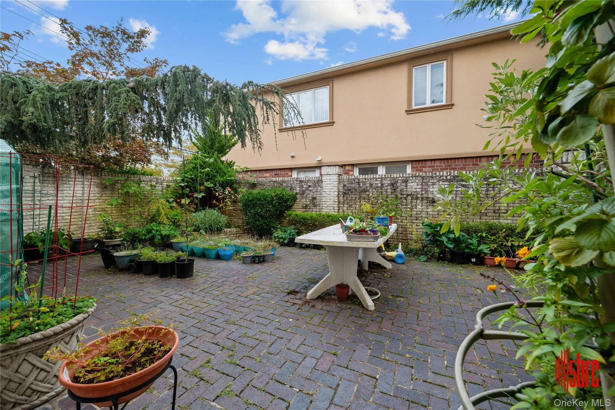 Fenced backyard with a patio Fenced backyard with a patio