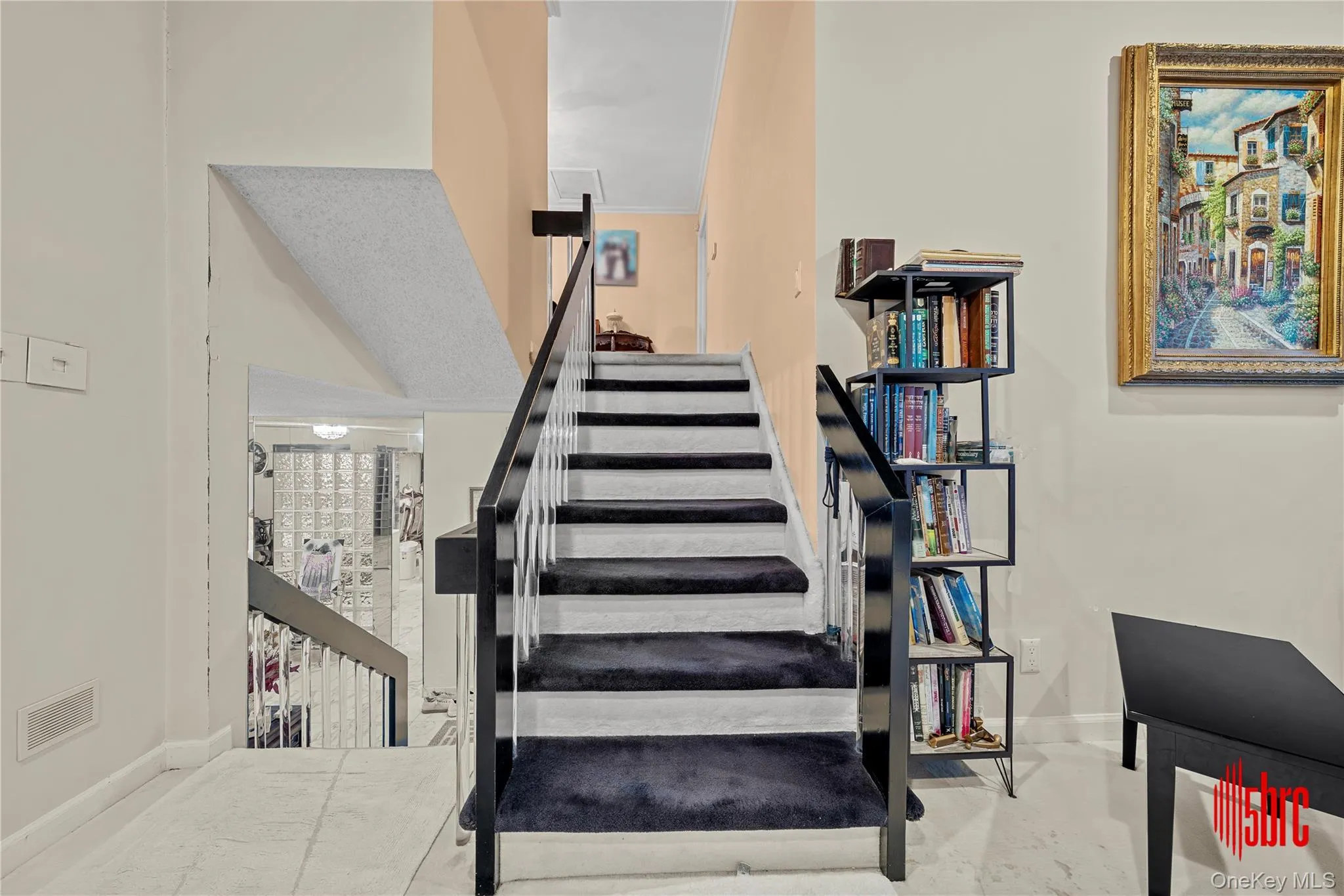 Stairway featuring baseboards Stairway featuring baseboards