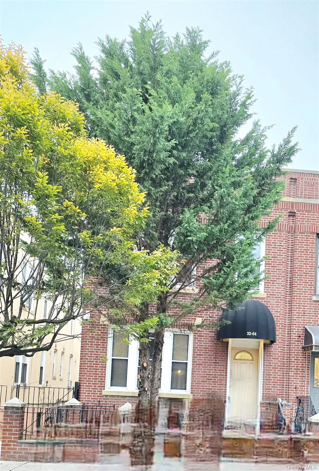 View of front facade featuring brick siding View of front facade featuring brick siding