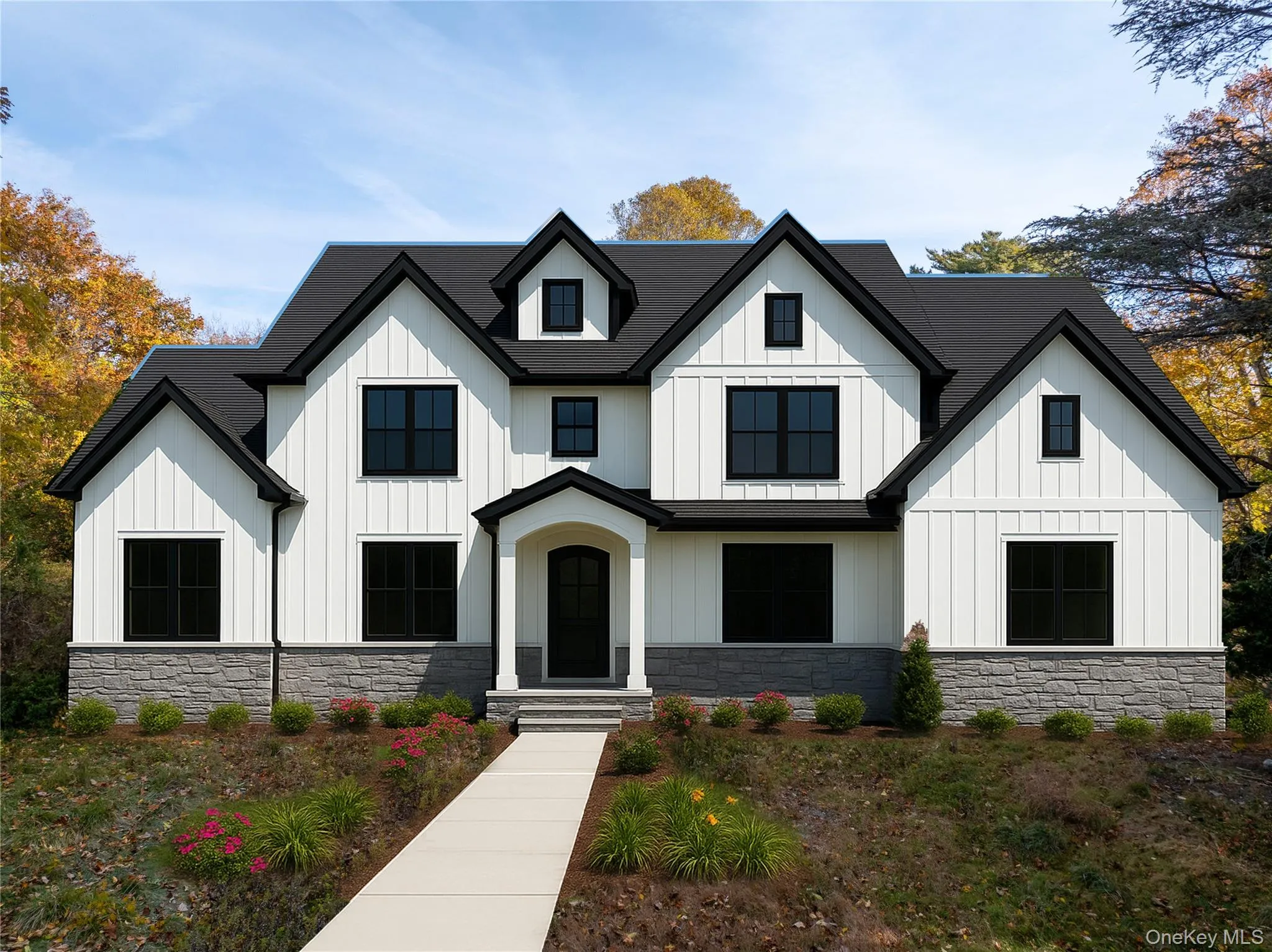 All Approved Building Plans for 3,800 sqft House View of front facade with board and batten siding and stone siding All Approved Building Plans for 3,800 sqft House View of front facade with board and batten siding and stone siding