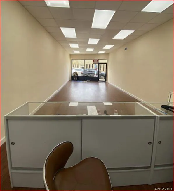 Office with a paneled ceiling Office with a paneled ceiling