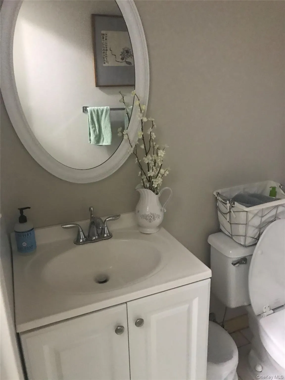 Bathroom with toilet and vanity Bathroom with toilet and vanity