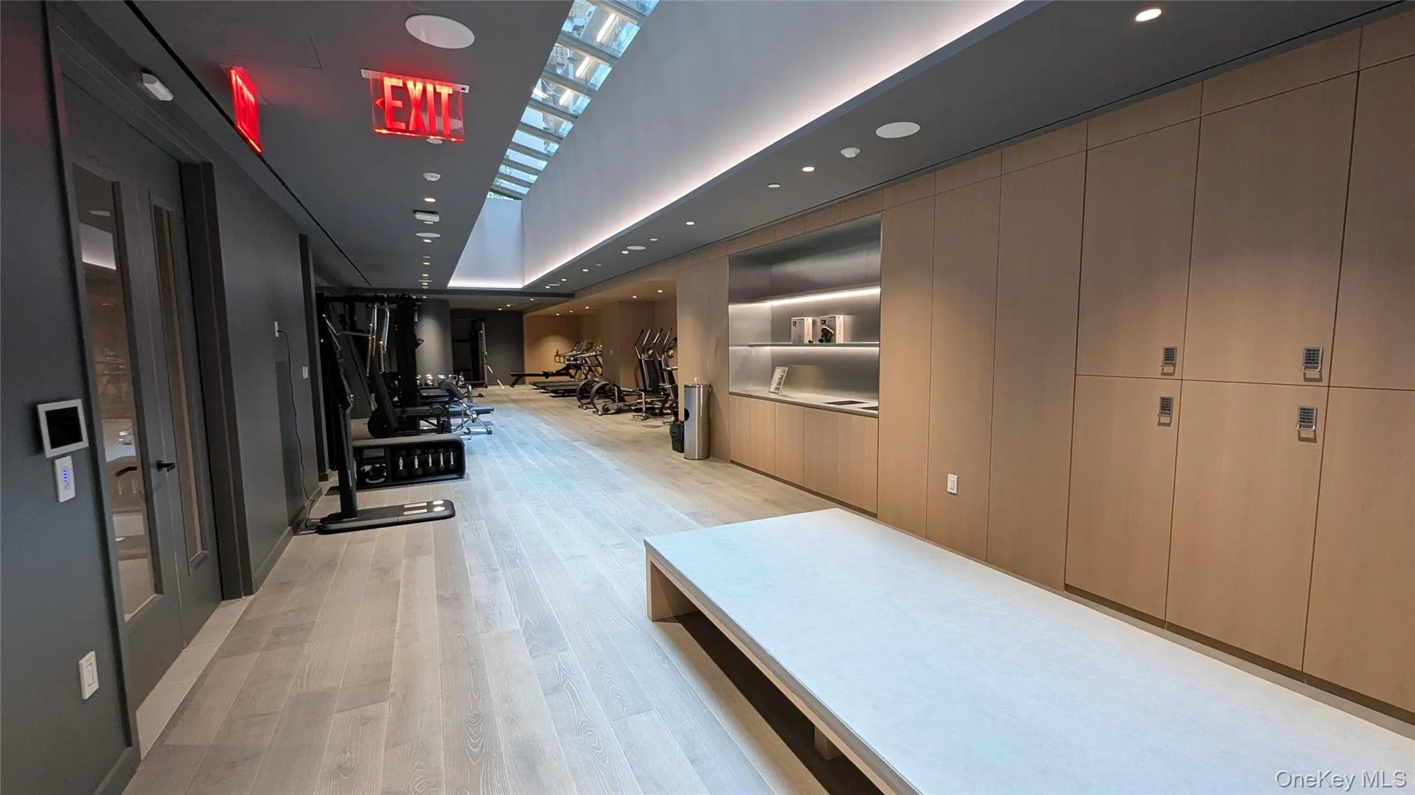 Hall featuring recessed lighting and light wood finished floors Hall featuring recessed lighting and light wood finished floors