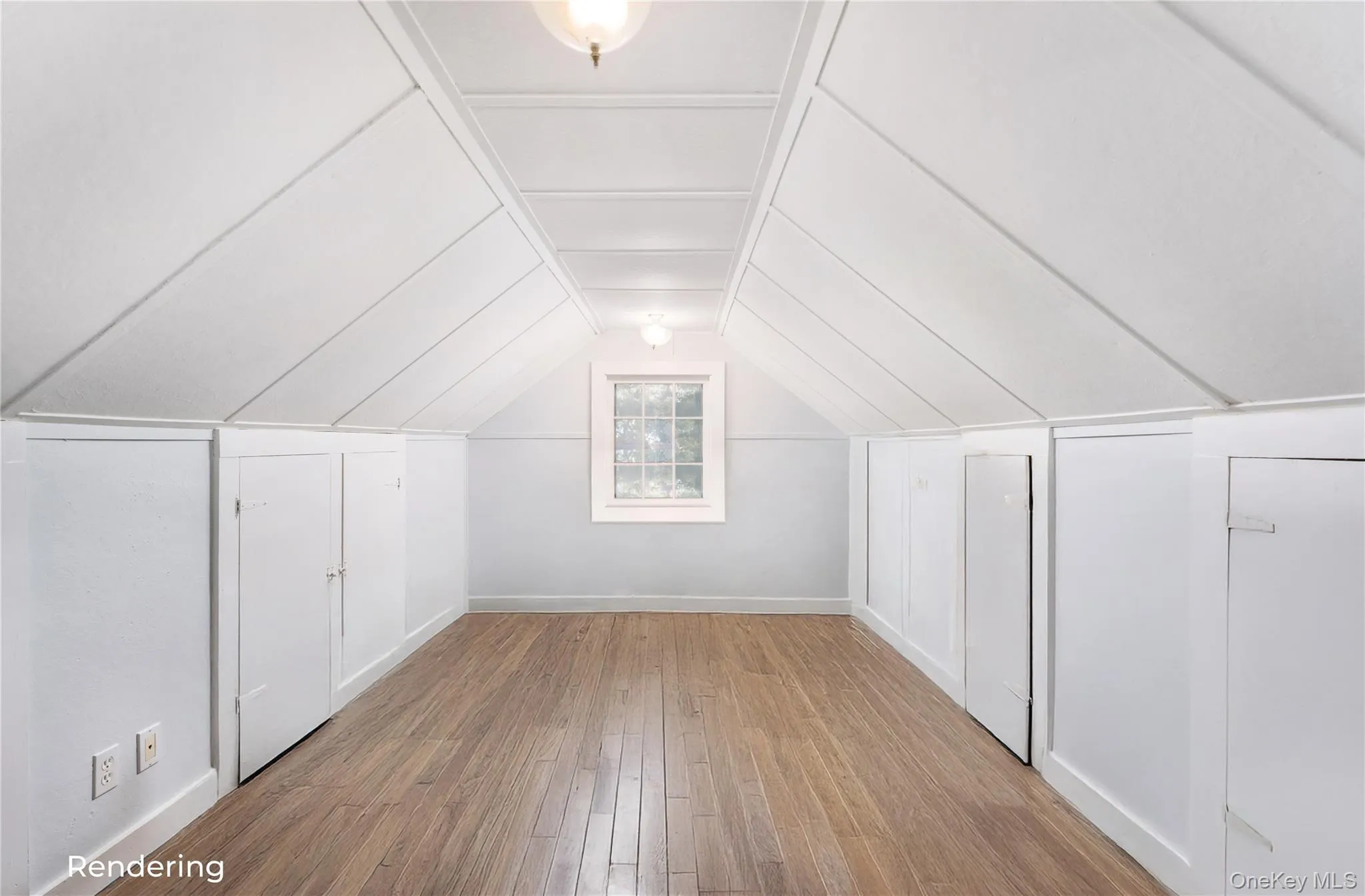 Bonus room with light wood-style flooring and lofted ceiling Bonus room with light wood-style flooring and lofted ceiling