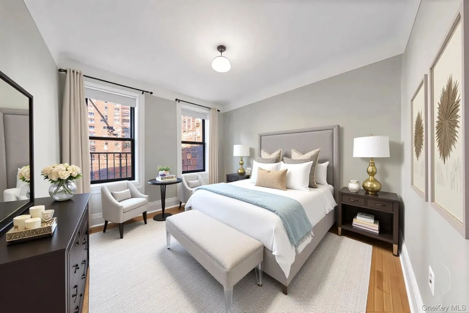 Bedroom (1/2) with light wood-style floors and baseboards Bedroom (1/2) with light wood-style floors and baseboards