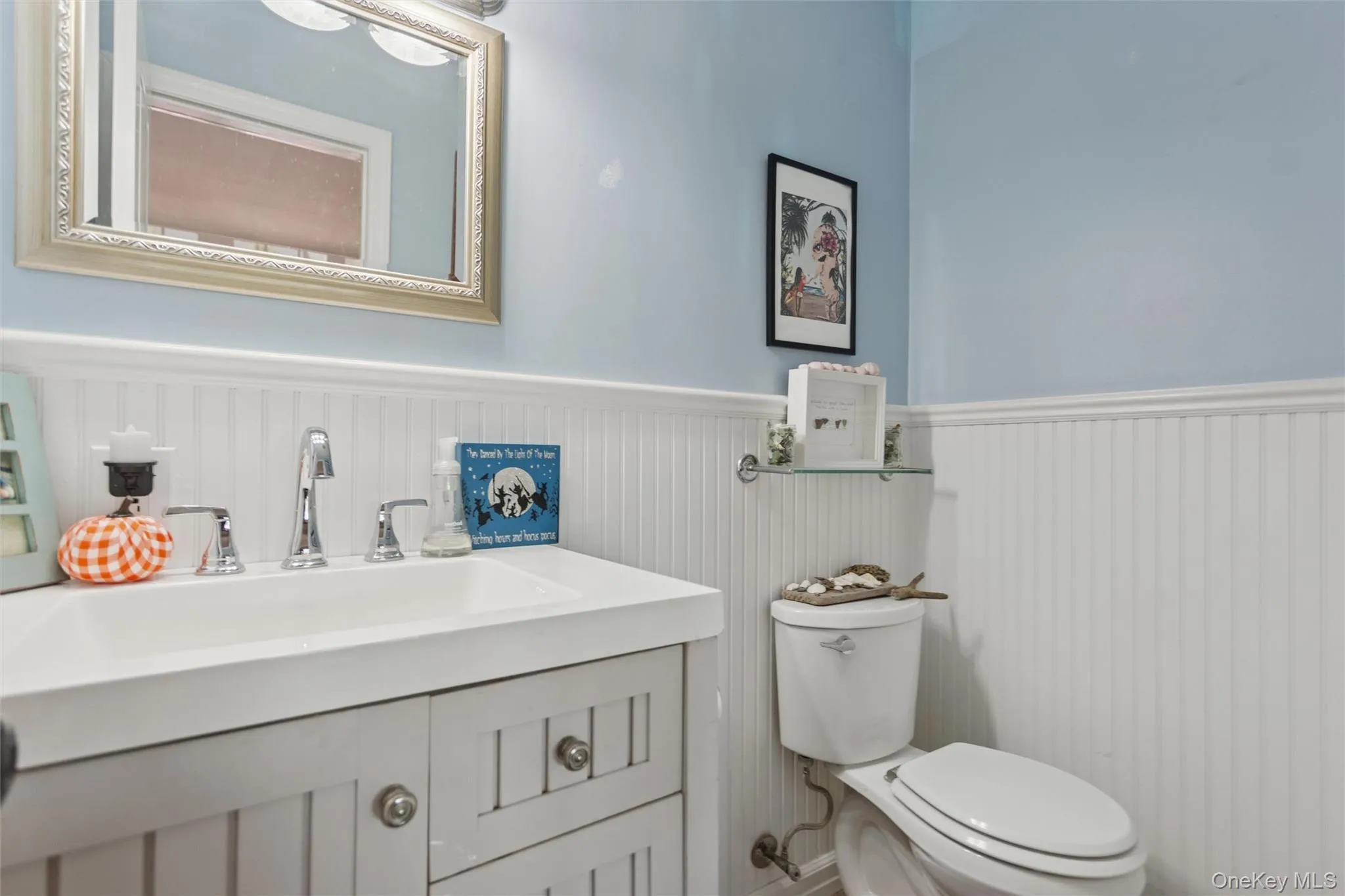 Bathroom with vanity and wainscoting Bathroom with vanity and wainscoting