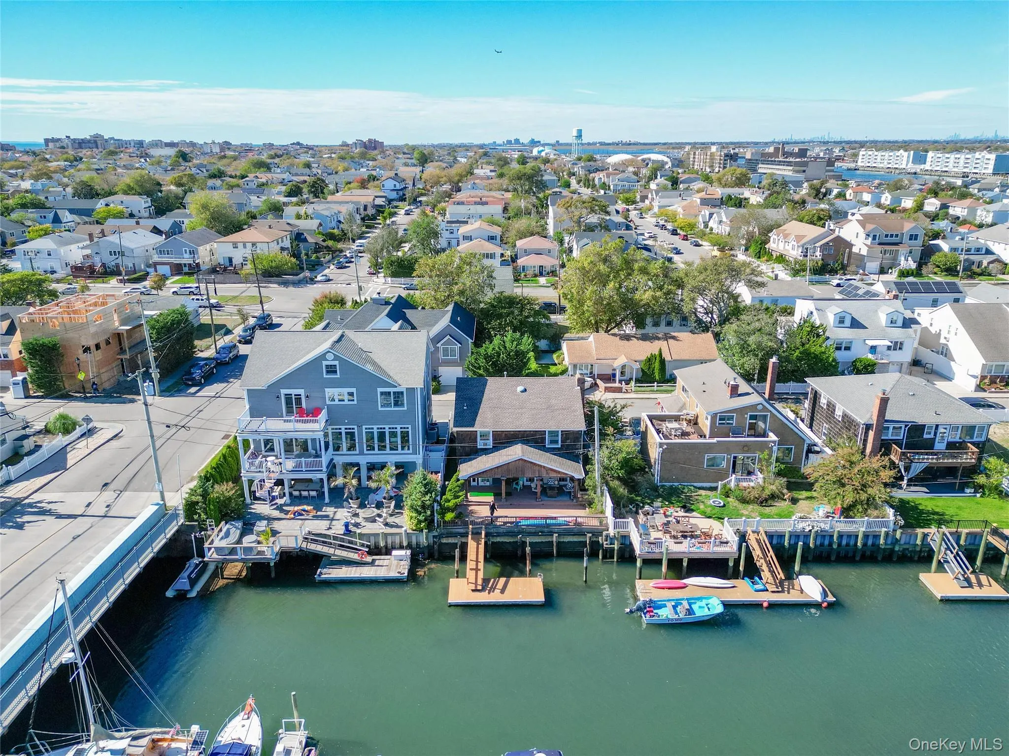 Aerial view of residential area with a nearby body of water Aerial view of residential area with a nearby body of water