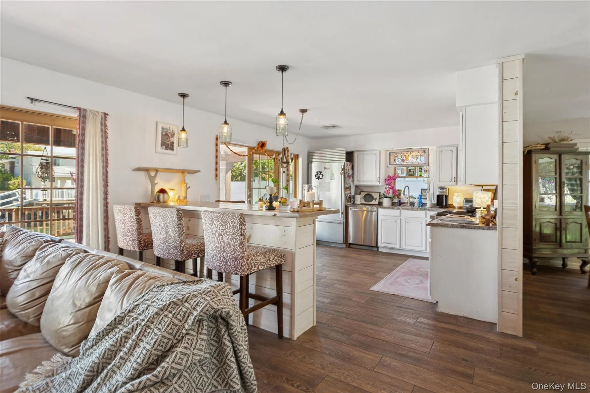 Living area with dark wood finished floors Living area with dark wood finished floors