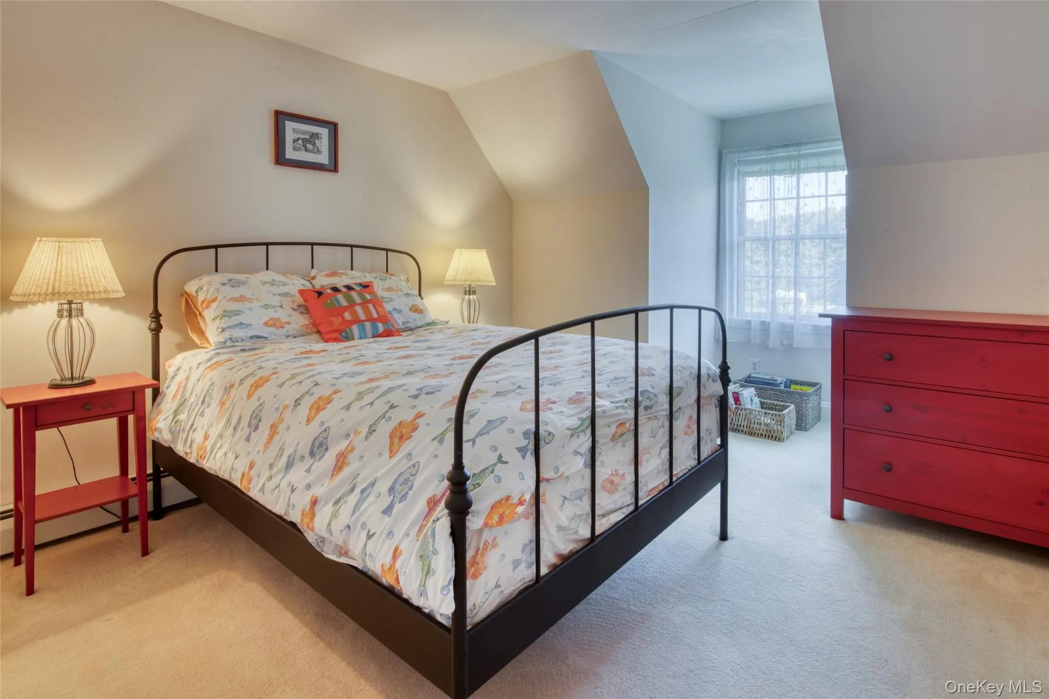 Bedroom with light carpet and vaulted ceiling Bedroom with light carpet and vaulted ceiling