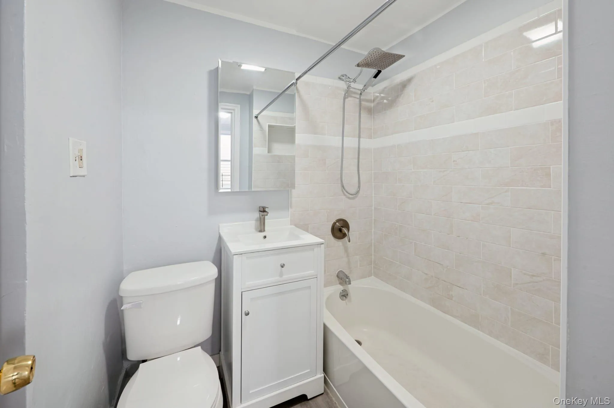 Full bathroom with washtub / shower combination and vanity Full bathroom with washtub / shower combination and vanity