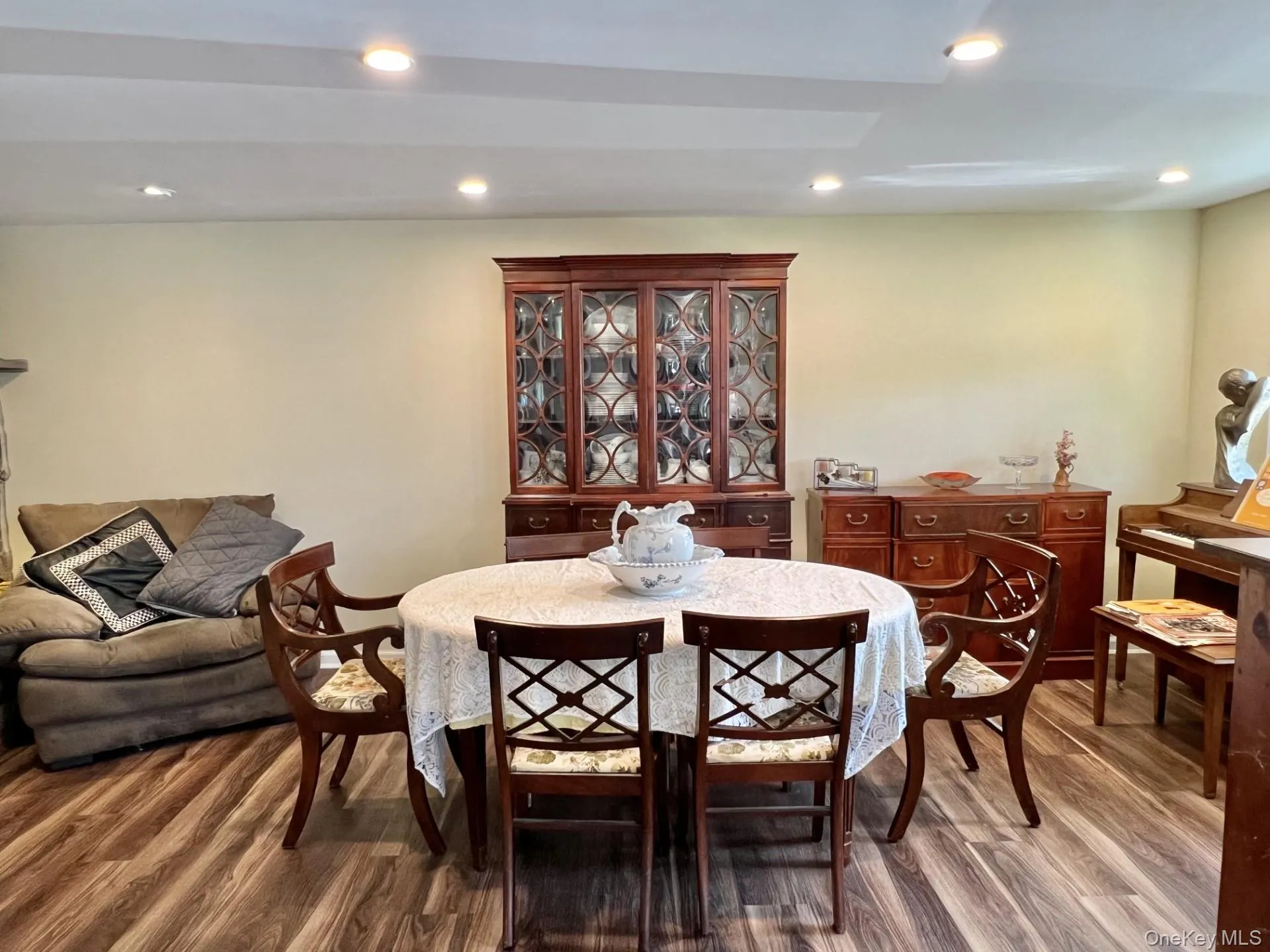 Dining room featuring recessed lighting and light wood-style flooring Dining room featuring recessed lighting and light wood-style flooring