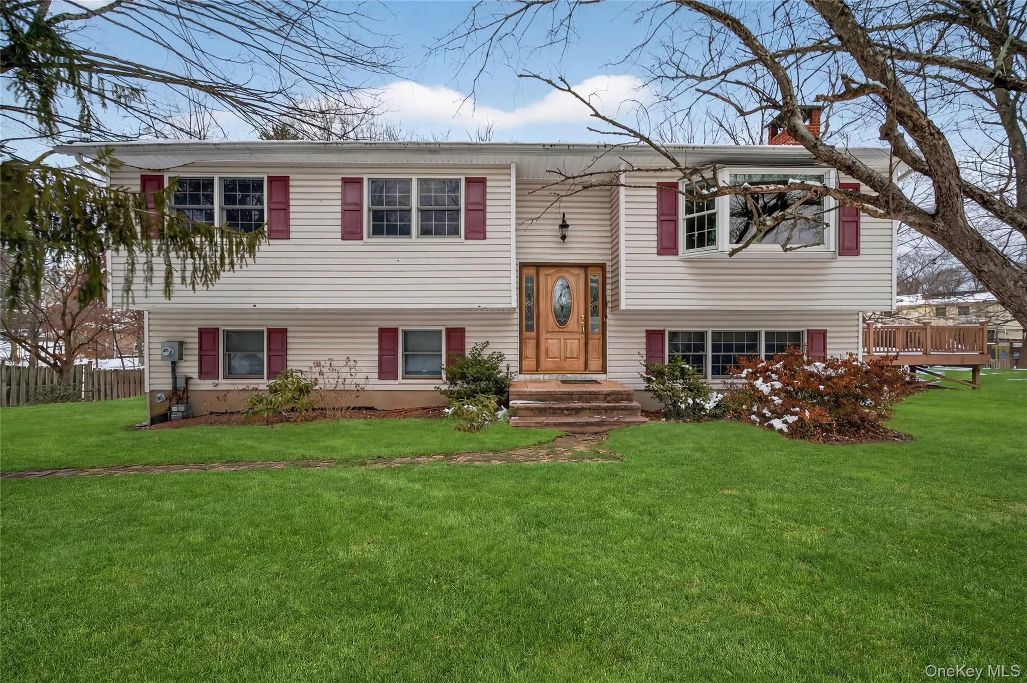 Split foyer home featuring a chimney Split foyer home featuring a chimney